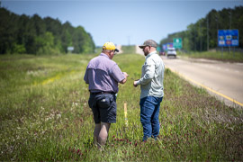 Dr. John Byrd and Chris Gregory, graduate student, discuss right-of-way management in Mississippi. (Photo by David Ammon)