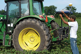 scientist at tractor